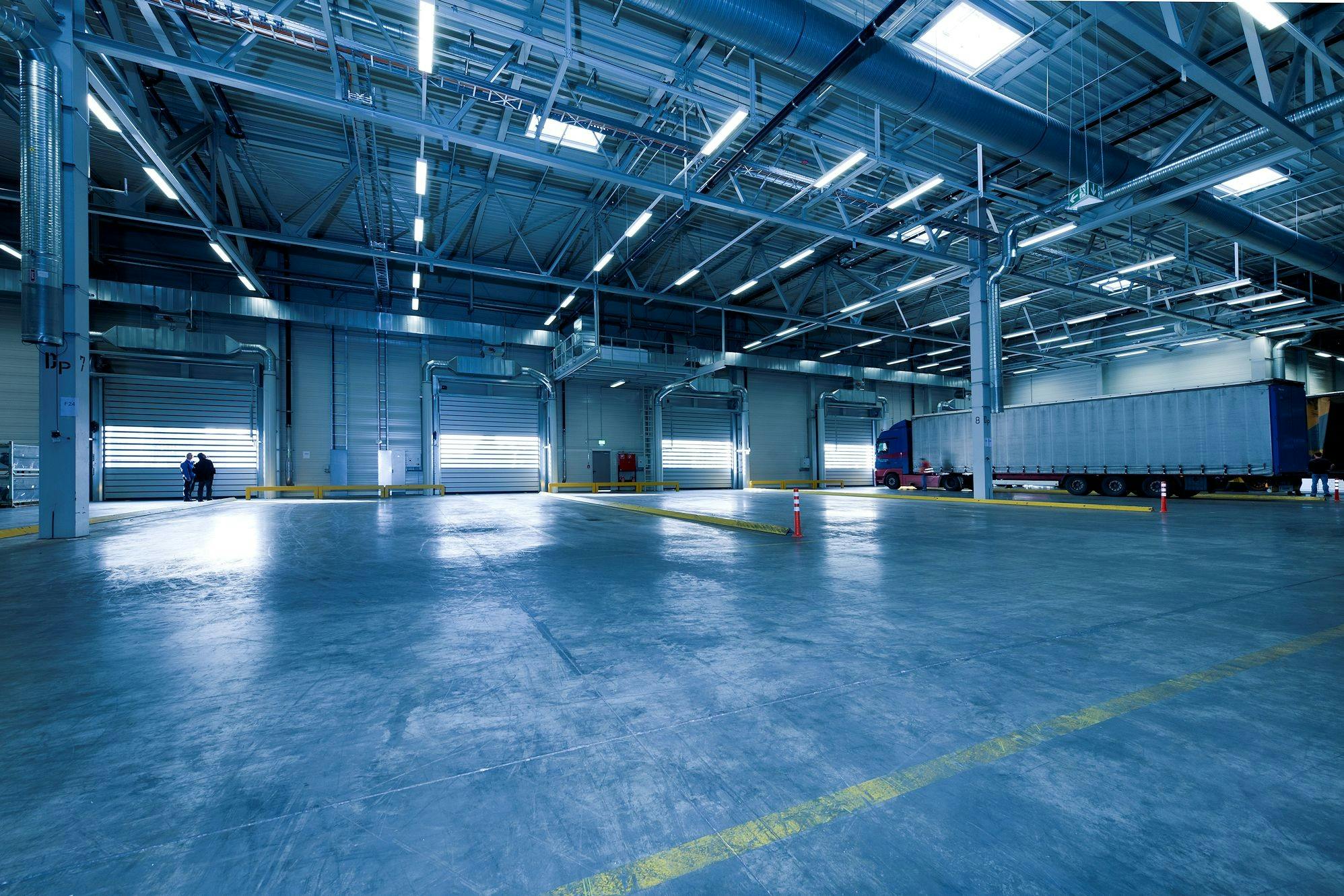 Industrial cold storage warehouse interior with organized storage systems